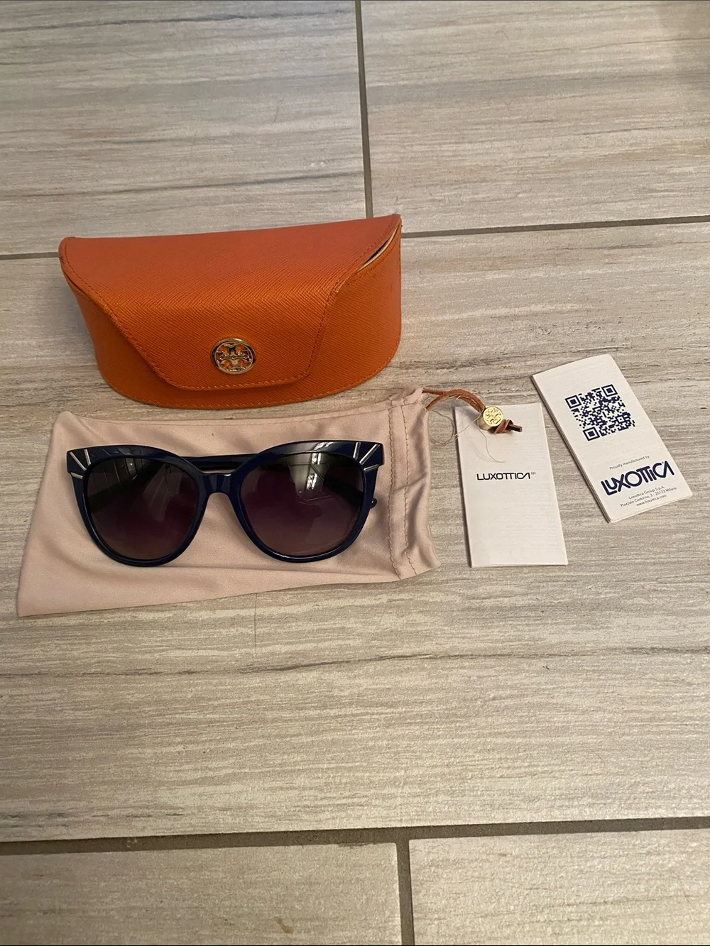 Tory Burch Navy sunglasses with cases.